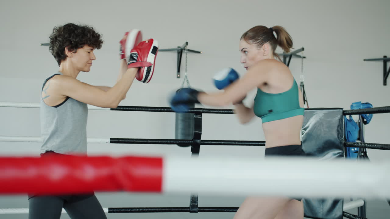 Women Boxing Training Session in Gym