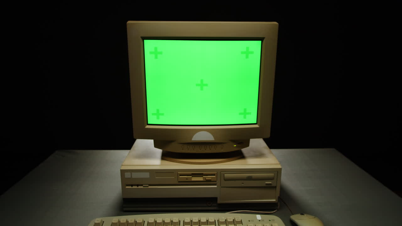 Vintage Computer Setup with Green Screen Monitor