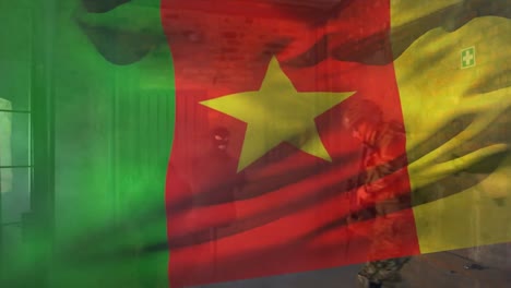 Animation-of-flag-of-cameroon-over-diverse-male-counter-terrorists-with-weapon-and-terrorists