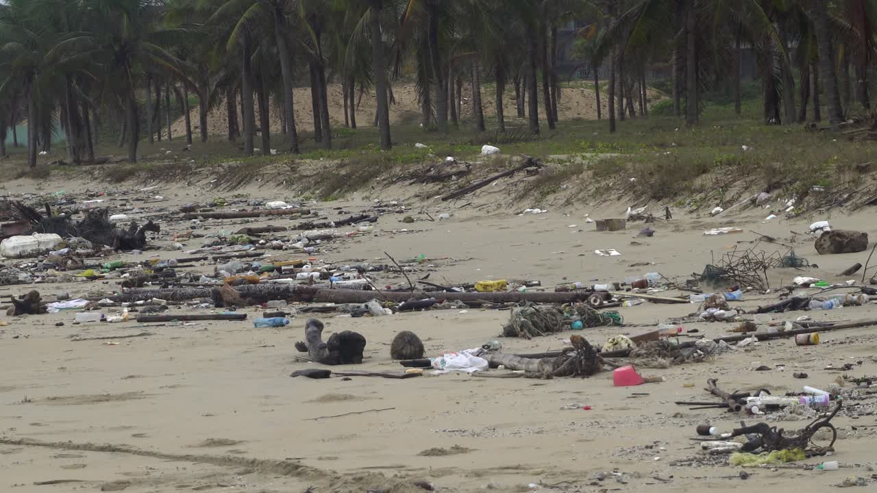 Dirty beach, plastic bottles, trash
