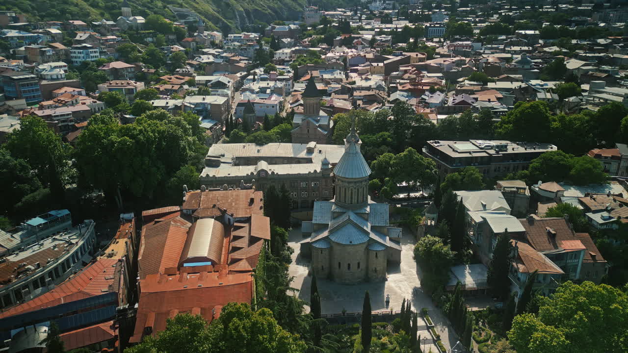 Aerial View of a Historic City with a Central Cathedral and Traditional Architecture
