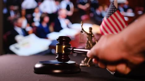 a hand forcefully striking a gavel, representing justice and the legal decisions made within a courtroom setting