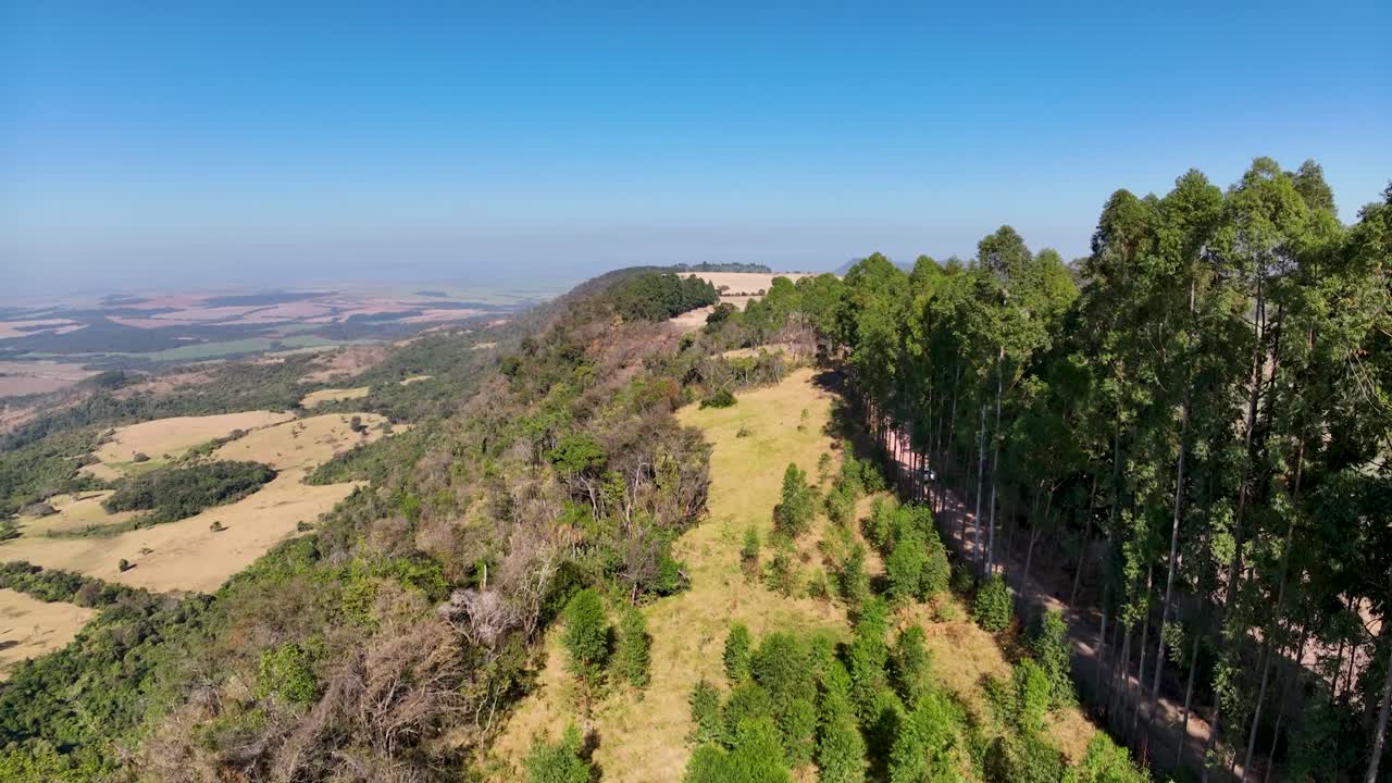 Mountain valley scenery. Aerial rural landscape. Green background. Scenic countryside landscape at green mountain valley. Farming scenery. Green valley mountain at rural scenery
