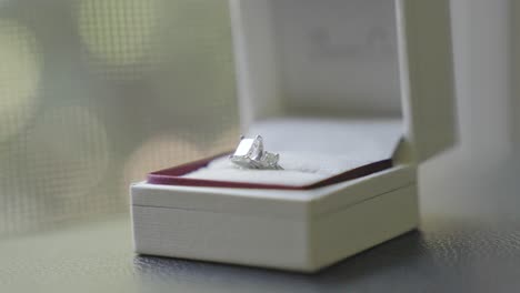 brides wedding ring in wedding box