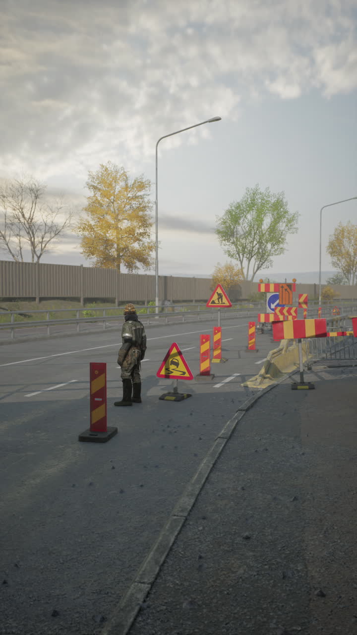Road worker managing construction site on busy urban street in autumn