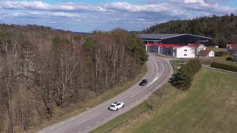 car driving through countryside in sunny sweden, outside gothenburg