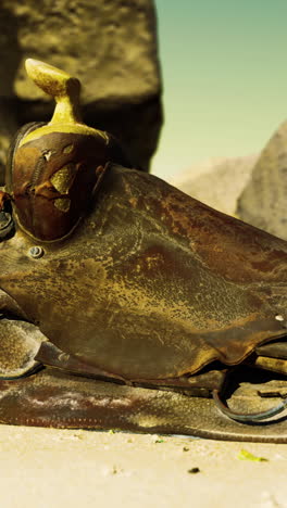 close-up of a worn leather saddle