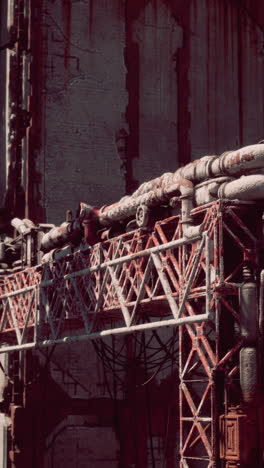 rusty pipes in an abandoned industrial building