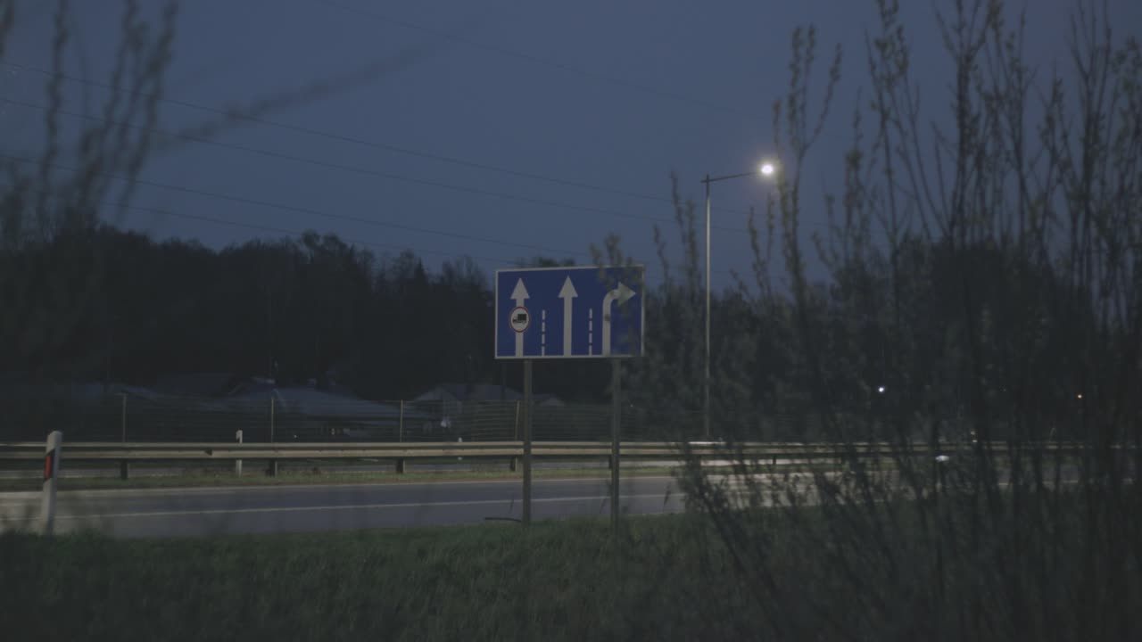 City road sign at night