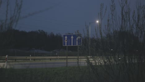 city road sign at night