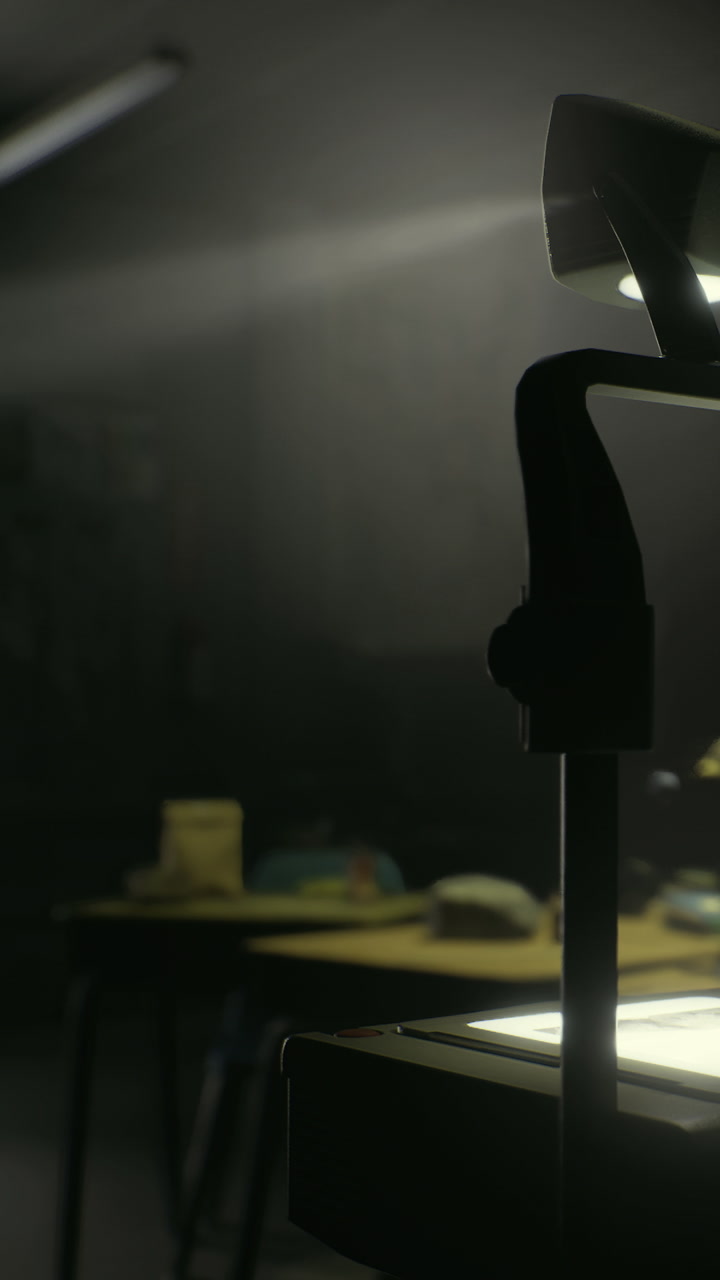 Projector shines light in a dark room during a creative workshop session
