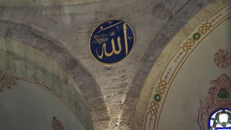 arabic calligraphy on mosque ceiling