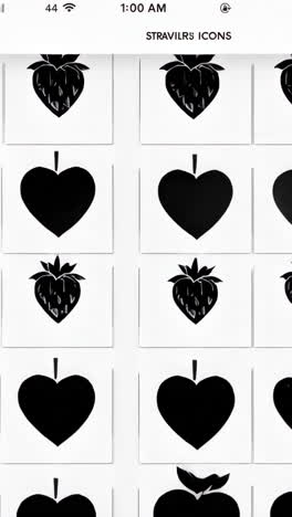 abstract grid of black and white strawberry heart icons