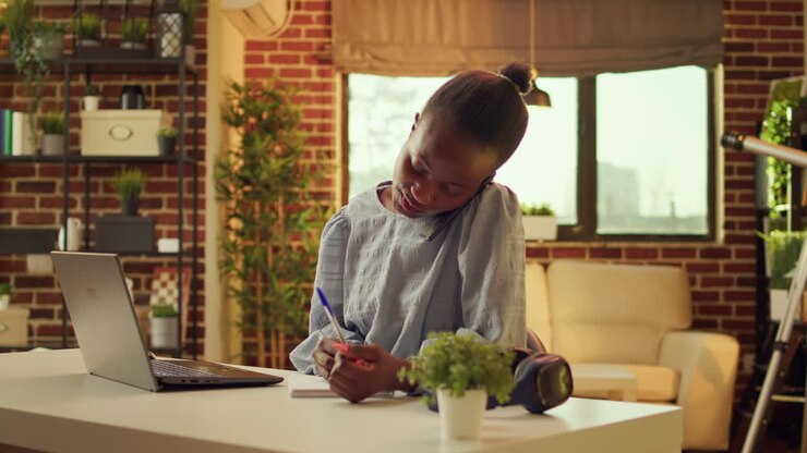 Woman takes handwritten notes