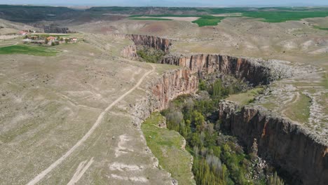 Stunning-long-aerial-shot-of-Ihlara-Valley-in-Cappadocia-region-of-Turkey