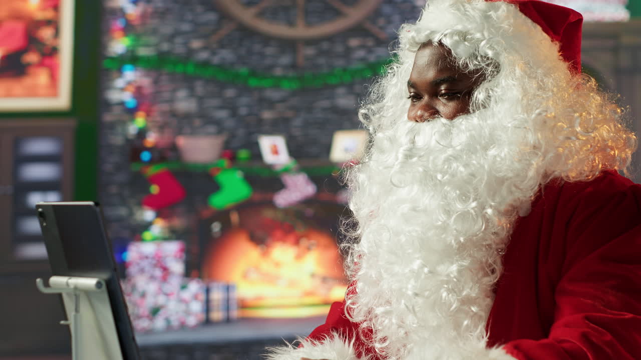 Santa Claus video calling during Christmas