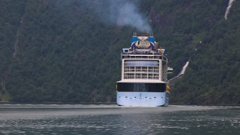 cruise ship, cruise liners on geiranger fjord, norway. tourism vacation and traveling.