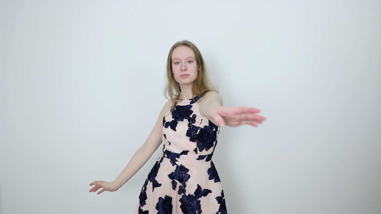 Elegant Dancer's Grace Attractive Female in Thoughtful Dance