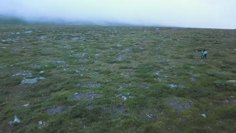 high mountain hiking adventure in misty conditions