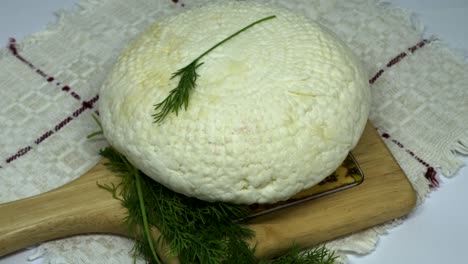 round soft white homemade cheese.