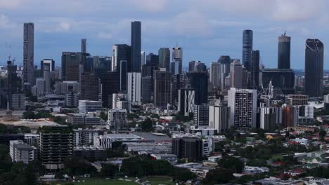 Brissy-Brisbane-City-River-Australia-aerial-drone-South-Bank-Park-Quay-ferry-boats-Skyline-skyscraper-cranes-Glass-House-Mountains-grey-cloudy-morning-summer-autumn-winter-Aussie-backwards-motion