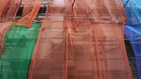 a scaffolding around the facade during renovation