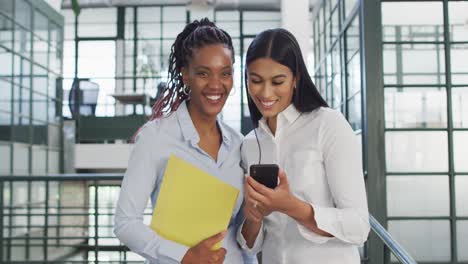 Portrait-of-happy-diverse-female-business-colleagues-at-office