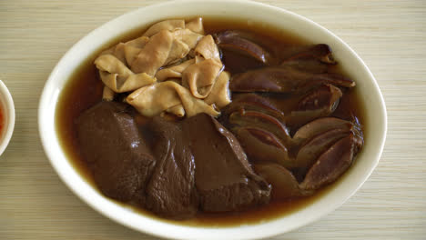 stewed duck offal in brown soup - asian food style-1