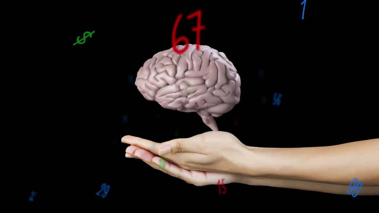 Animation of numbers changing over human brain spinning over woman's hands