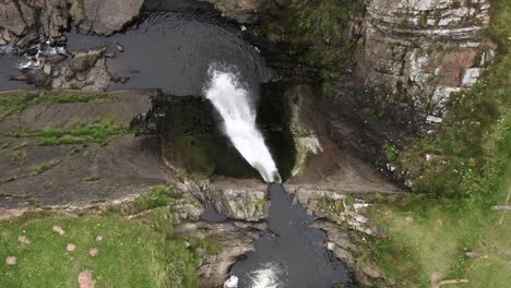 Spekes-Mill-Mouth-Waterfall-and-Pool,-North-Devon,-Top-Down-Descending-Approach