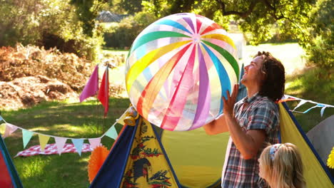 couple playing with a beach ball