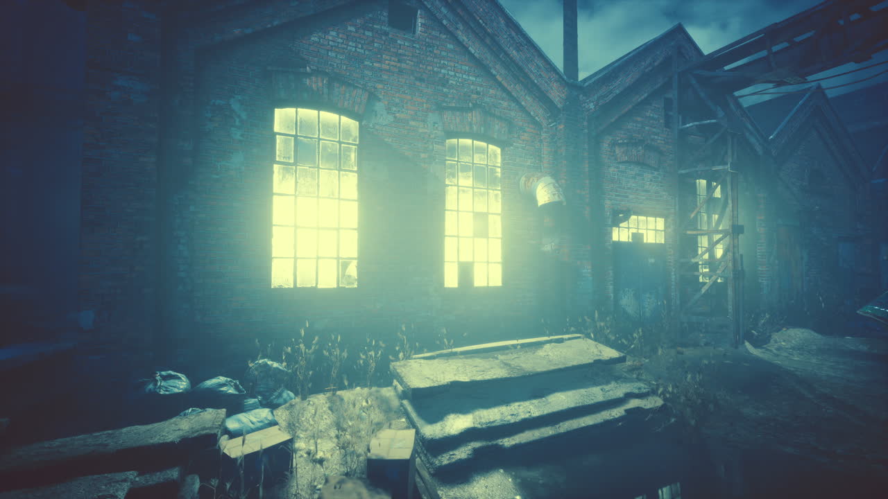 야간에 큰 버려진 산업 지역