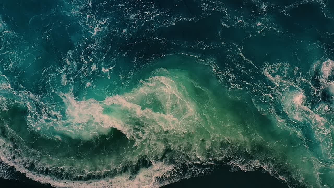 Waves of water of the river and the sea meet each other during high tide and low tide.