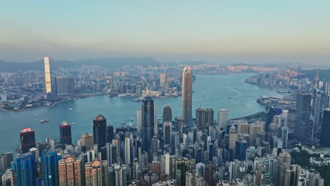 an aerial view of a large city and a body of water