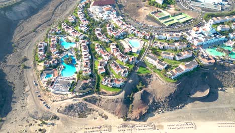 Aerial-view-of-a-luxury-hotel-along-the-coast-Hotel-Princess-Fuerteventura,-Canary-Islands,-Spain