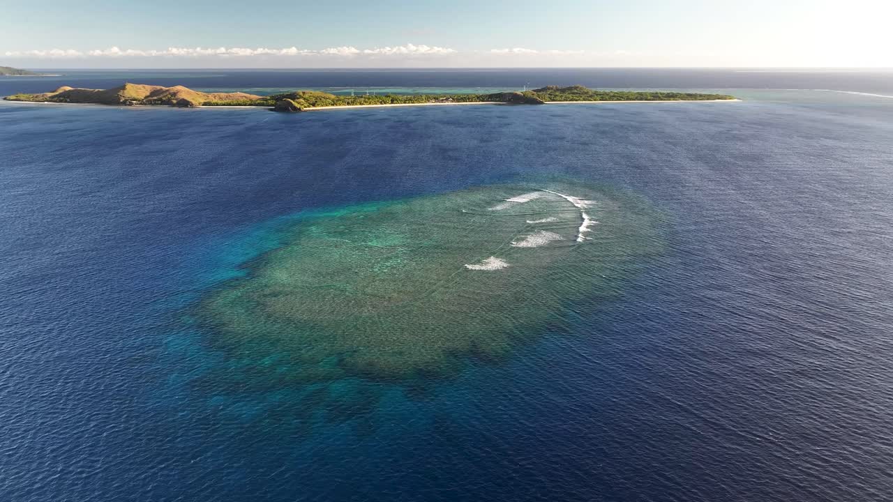 Clear Turquoise Waters On The Remote Island Of Mana In Mamanuca Islands, Fiji. Aerial Drone Shot