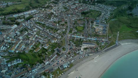 Tilt-down-aerial-over-Chesil-Beach-and-the-Portland-beach-road-on-the-Isle-of-Portland