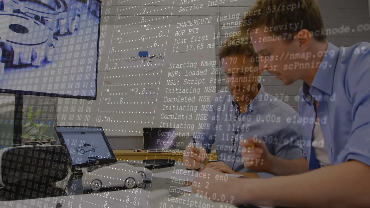 Engineers marking sketches in meeting, laptop initiating terminal overlay for diagnostic review