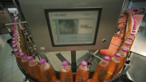 automated beverage bottling line in a food processing plant