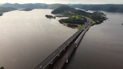 Drone-aerial-pan-shot-of-Brooklyn-Harbour-Hawkesbury-River-Bridge-Pacific-Motorway-with-cars-NSW-Hornsby-Sydney-Australia-3840x2160-4K