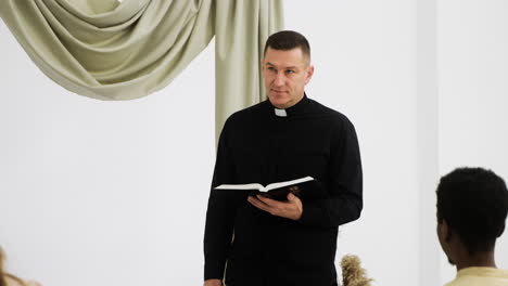 Priest-with-the-Bible