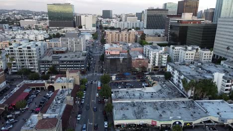 Beautiful-golden-hour-aerial-view-of-a-dense-city-neighborhood-in-Los-Angeles