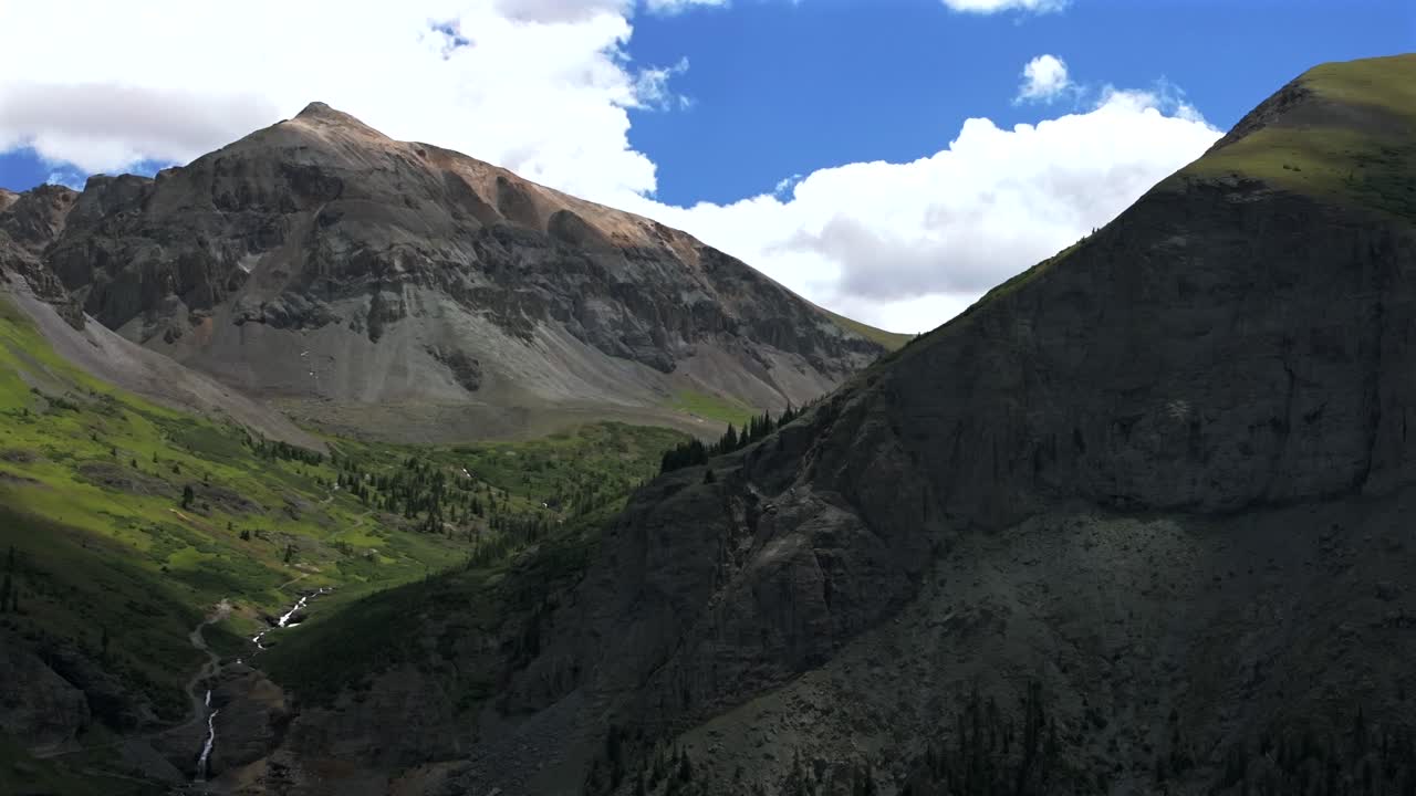 Yankee Boy Basin 4wd hiking bluesky cliffside valley aerial drone Ouray Ridgway Stunning summer Telluride Colorado Box Canyon Black Bear Pass Road Bridal Veil Falls Aspen Forest circle right motion