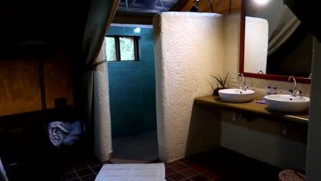 panning shot of a complete bathroom in a luxury tent at tarangire national park