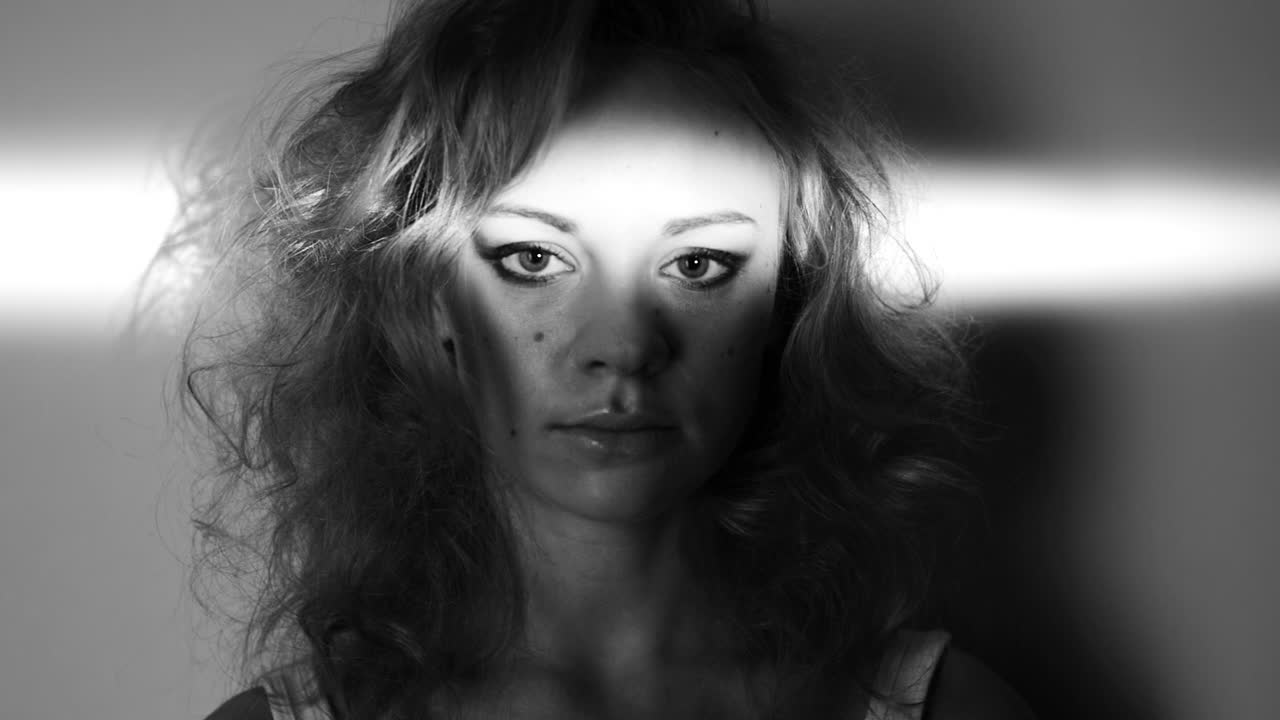 Woman Portrait in Black and White with Light and Shadow