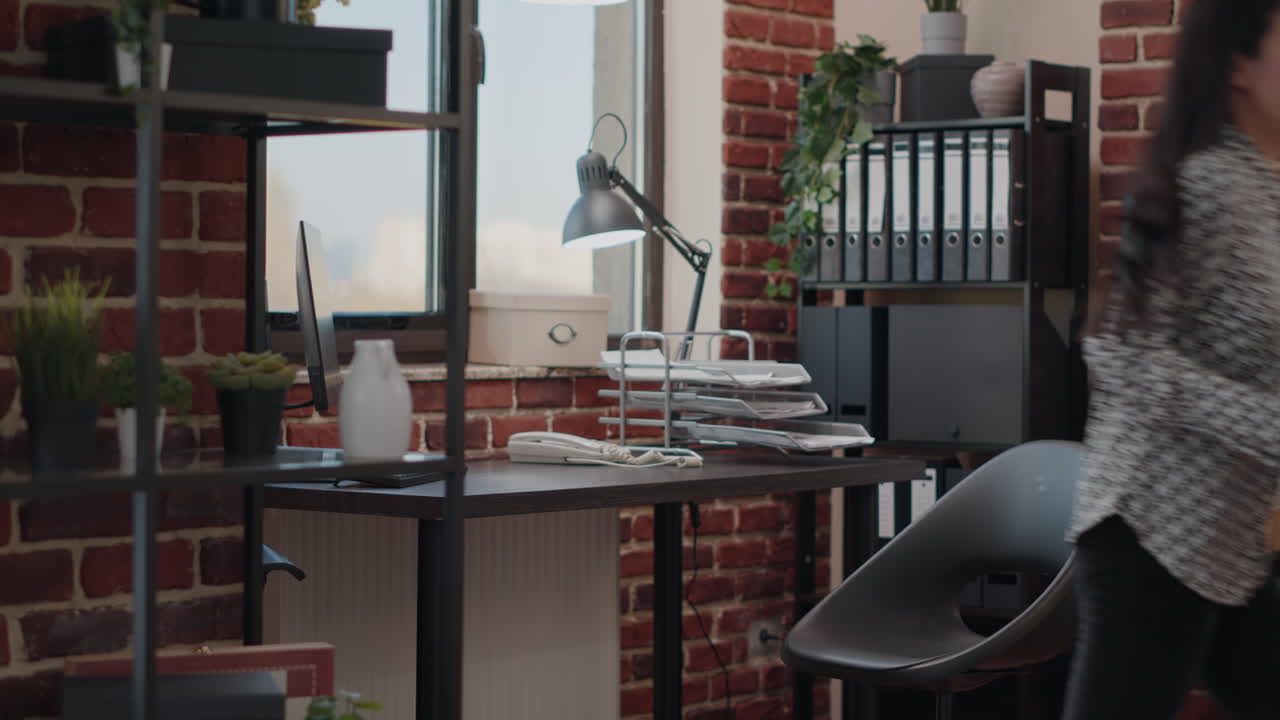 Person gathering office belongings after getting fired