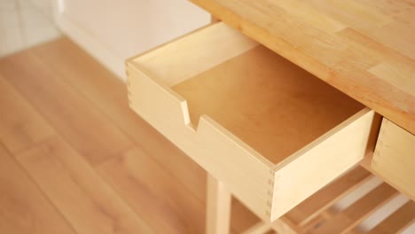 empty light brown wooden drawer