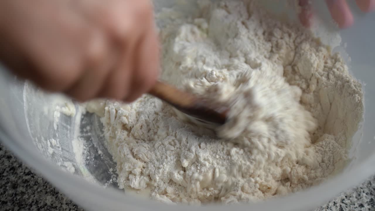 Close-up of a mixture of flour with water and yeast to make homemade bread