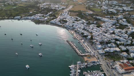 aerial footage of the town and port of parikia on the island of paros, one of the many cyclades islands in the aegean sea