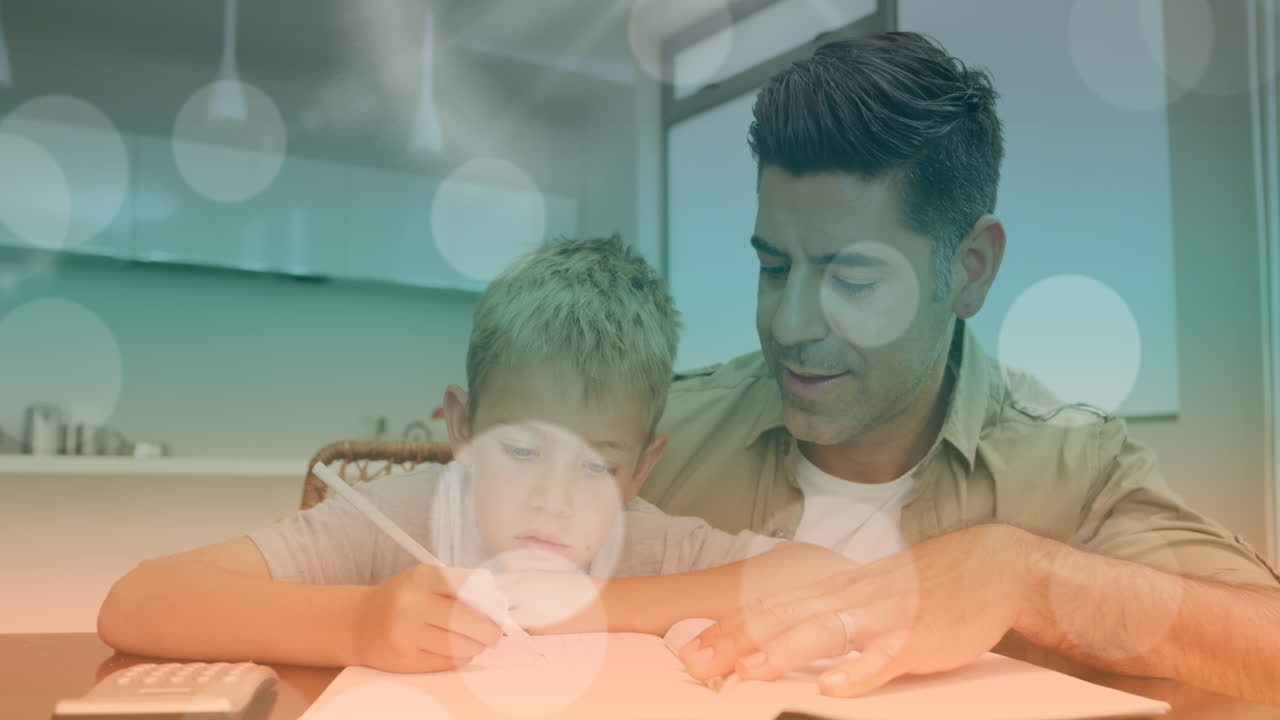 animación de bokeh sobre feliz padre caucásico ayudando a su hijo a hacer la tarea